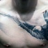 Realism style black and white chest tattoo of very detailed crow