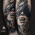 Realism style black and white forearm tattoo of woman with mask and rose
