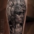Realism style black and white very detailed leg tattoo of Egypt Goddess