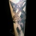 Realism style black ink forearm tattoo of goat skull with star