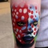 Realism style colored arm tattoo of tribal woman