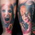 Realism style colored forearm tattoo of vampire woman and man