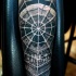 Realism style colored forearm tattoo of demonic skull with spider web
