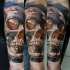 Realism style colored forearm tattoo of big human skull
