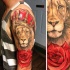 Realism style colored shoulder tattoo of lion with crown and rose
