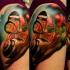 Realism style colored shoulder tattoo of snail with butterfly