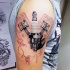 Realism style colored shoulder tattoo of pistons and spark-plug
