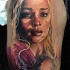 Realism style colored shoulder tattoo of The Games of Thrones dragon queen