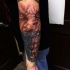 Realism style colored sleeve tattoo of werewolf transformation