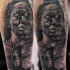 Realism style detailed arm tattoo of tribal woman with snake
