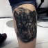 Realismus Stil detailliertes schwarzes Panther Tattoo am Beinmuskel