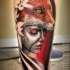 Realism style very detailed leg tattoo of tribal woman with fox mask
