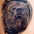 realistico orso nero ruggente tatuaggio