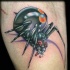 Realistic karakurt  spider tattoo
