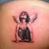 piccolo angelo triste tatuaggio