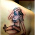 marinaio pin up ragazza tatuaggio sulla scapola