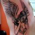santa morte angelo tatuaggio sulle costolette
