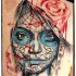 Tatuaje de la santa muerte en el hombro
