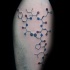 Science themed and colored tattoo