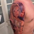 Sexy colored very detailed shoulder tattoo of woman