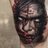 incredibile dipinto molto realistico terrificante mostro insanguinato tatuaggio su braccio