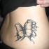 semplice farfalla tatuaggio idea per ragazza indietro