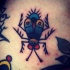 Tatuaje  de mosca de varios colores