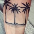 Tatuaje  de  palmeras simples finas en el antebrazo