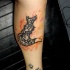 Tatuaje en el brazo, zorro tribal excelente en llamas