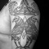 Simple homemade style shoulder tattoo of crows with crown