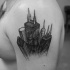 Simple illustrative style black ink shoulder tattoo of modern city sights