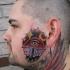 Simple mystical looking head tattoo of big umbrella and eye