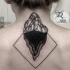 Simple unfinished black ink back tattoo of small rock