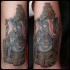 Tatuaggio colorato Ganesha seduta by Damion Ross