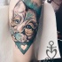 Sketch style colored arm tattoo of beautiful cat with heart