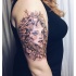 Sketch style colored shoulder tattoo of woman with jewelry and crown