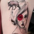 Sketch style colored thigh tattoo of woman face and wolf