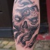 Skull with third eye tattoo by graynd