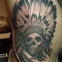 cranio indiano copricapo tatuaggio sulle costolette