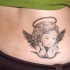 piccolo angelo tatuaggio su parte bassa della schiena
