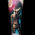 Small cartoon style arm tattoo of big Egypt God statue