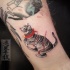 Small cartoon style tattoo of maneki neko japanese lucky cat