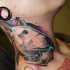 Small illustrative style neck tattoo of little dog