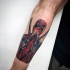 Small nice looking arm tattoo of Deadpool with pistols