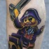 Small pirate tattoo on leg