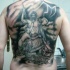 Tatuaje de Zeus majestuoso  impresionante  en la espalda, colores negro blanco