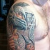 Spectacular cartoon style colored shoulder tattoo of fantasy ancient warrior