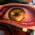 Spectacular colored biceps tattoo of creepy human eye