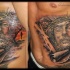 Spectacular dramatic religious style side tattoo of Jesus portrait