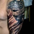 Spectacular religious style colored shoulder tattoo of dramatic Jesus portrait